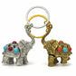 Decorative elephant keychains in silver and gold with colorful red and turquoise accents
