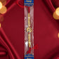 Gold peacock design rakhi with red thread and decorative beads