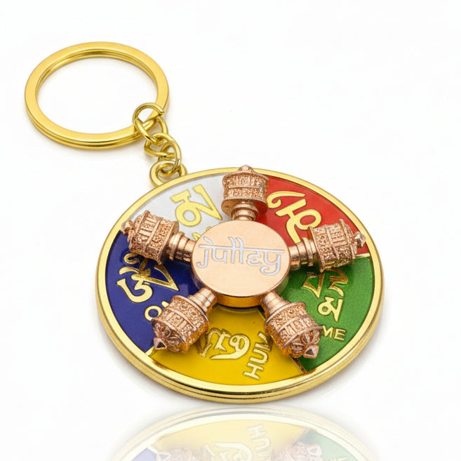 Gold Tibetan five prayer wheel keychain with colorful Om Mani Padme Hum design