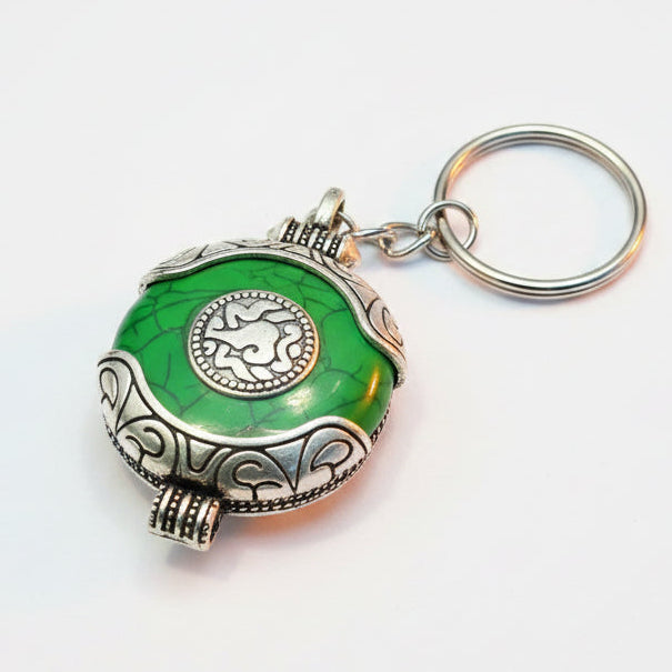 Green Tibetan Style Om Pendant Keychain with Silver-Tone Decorative Detailing