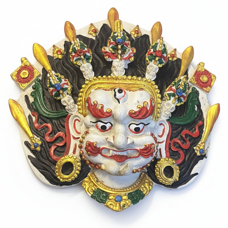 Handcrafted clay Seto Bhairav mask with white face, third eye, ornate crown and colorful Nepali detailing