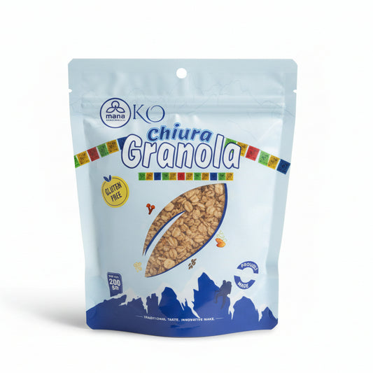 Front packaging of Mana KO Chiura Granola (200g) featuring a leaf-shaped window showing the beaten rice mix and Himalayan prayer flags.