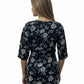 Modern black and white floral print short kurti with elbow length sleeves for casual ethnic wear.