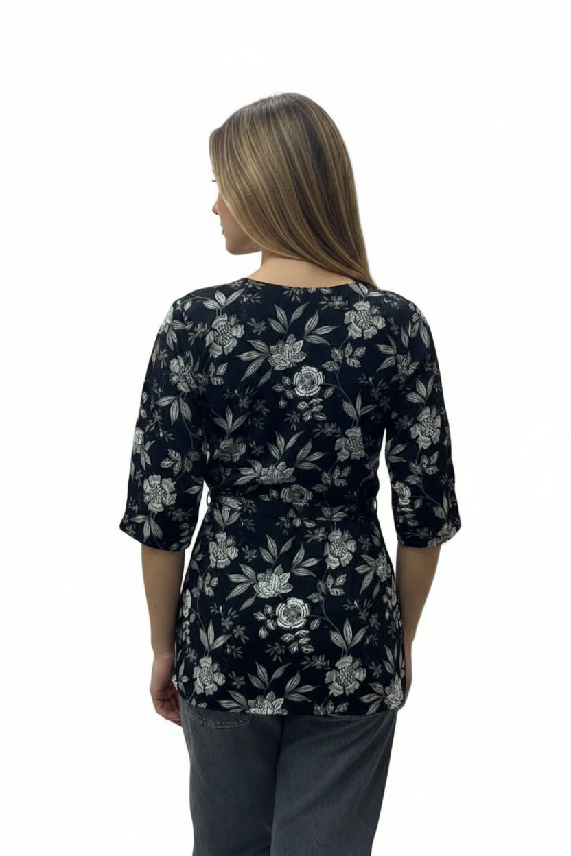 Modern black and white floral print short kurti with elbow length sleeves for casual ethnic wear.