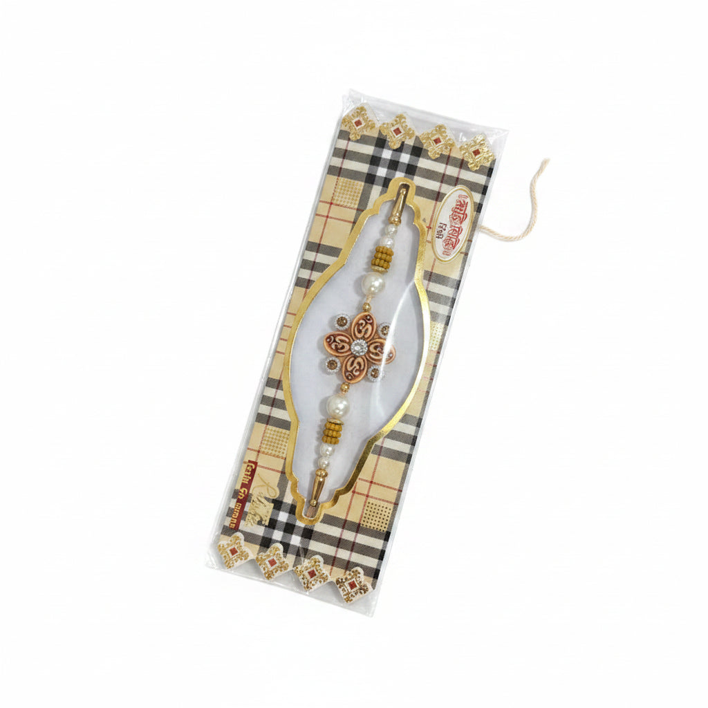 Pearl and floral designer rakhi with decorative gold detailing