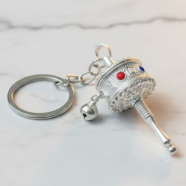 Tibetan Prayer Wheel Keychain – Silver Tone with Red & Blue Accents