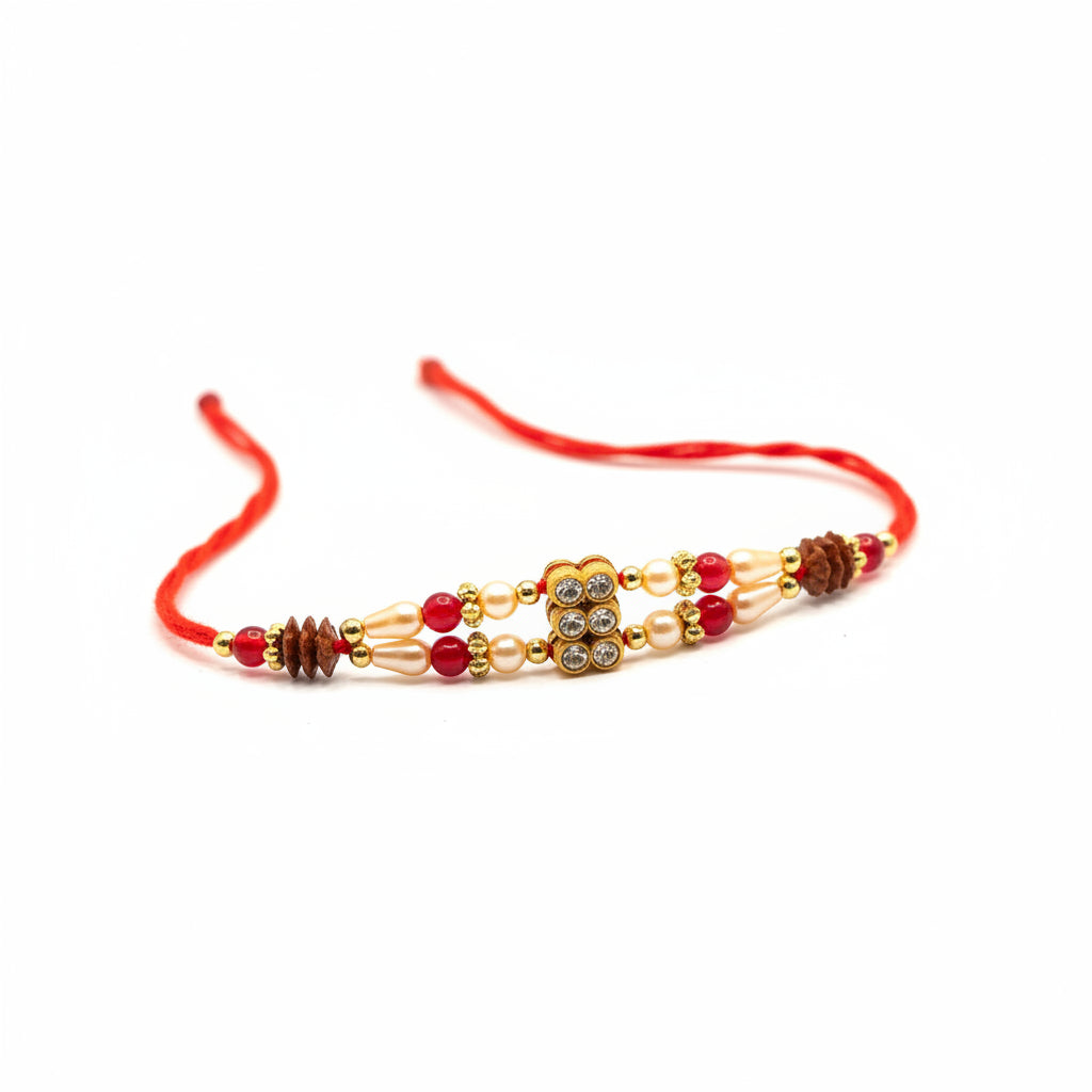 Red and pearl beaded rakhi with elegant floral design