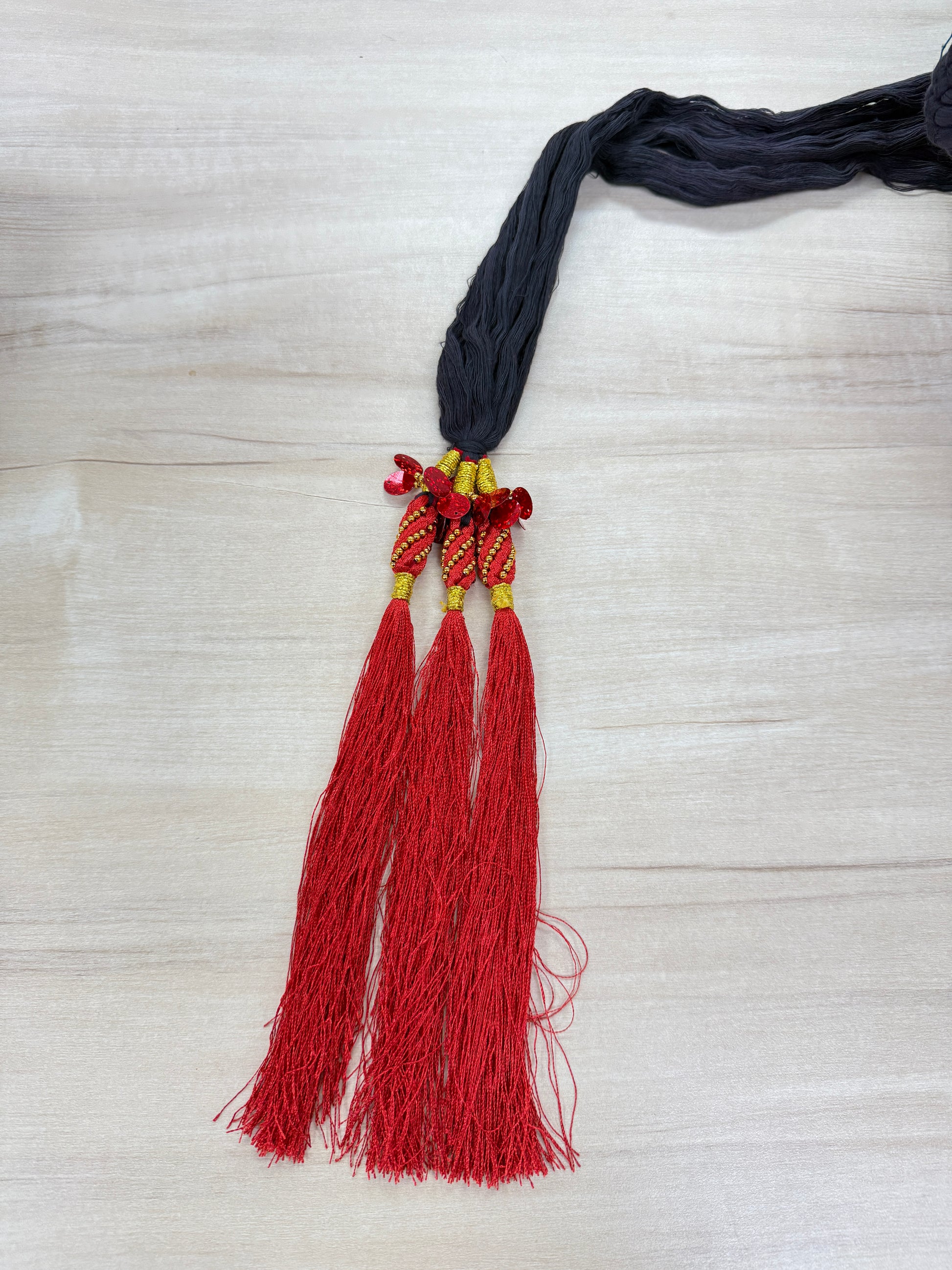 Red and black lachchha 