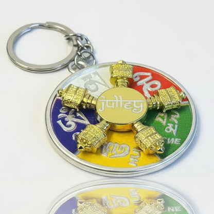 Silver Tibetan five prayer wheel keychain with colorful Om Mani Padme Hum design