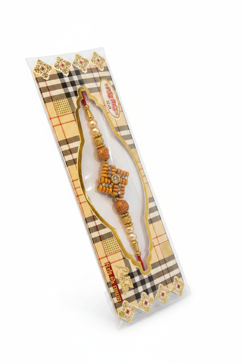 Traditional square centerpiece rakhi with pearl and gold bead detailing