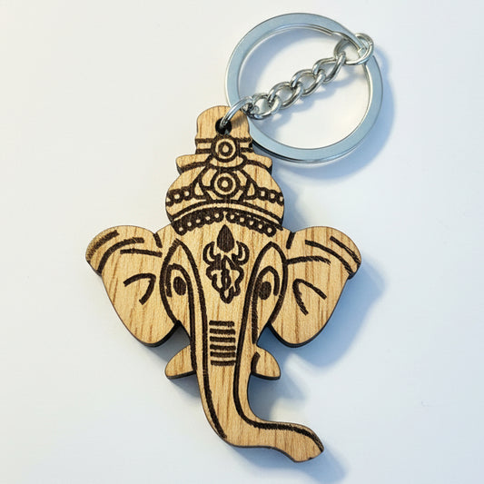Wooden Lord Ganesha elephant head keychain with engraved design and metal keyring