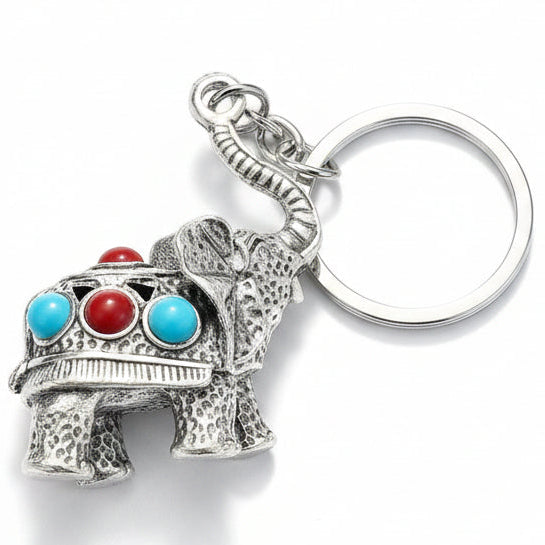 Silver-tone decorative elephant keychain with red and turquoise-style accents