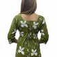 Stylish sage green short kurti with a leaf pattern design, perfect for casual wear.